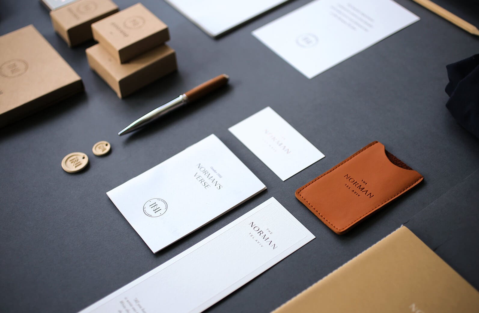 Anders brand wordmark in white placed on top of an image of a modern interior design.
